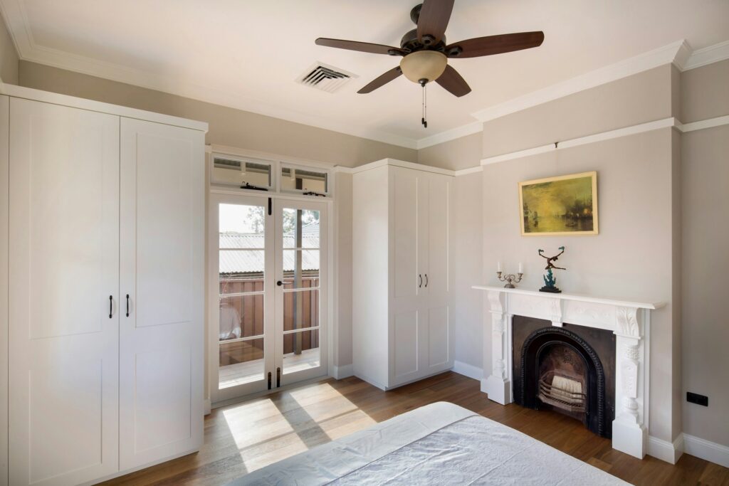 Built-in wardrobe storage solutions small Australian homes — floor-to-ceiling joinery 2026